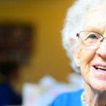 An older woman smiling - Dental care for older patients